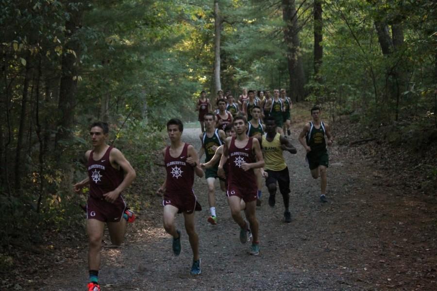 Everest Crawford (left) leads the boys cross country team at Lynn Woods. 