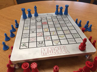 Machine shop students crafted this comic book themed chess board for the G.H.S. chess club