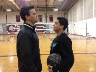 Freshmen Seth Maciel (right) stares down his competition, history teacher Shaun Goulart 