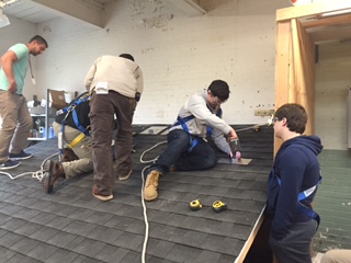 Electrical students training for solar panel installation