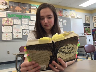 Freshmen Haley Johnson reads her favorite novel To Kill A Mockingbird