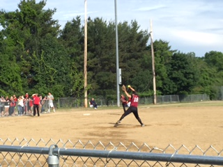 Junior Karina Keenan pitches against Burlington in their playoff game