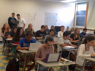 Freshmen history students working on Chromebooks