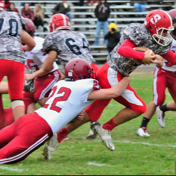 Senior defensive end John Philpott lunges for tackle for Saugus quarterback in their 43-0 victory last Saturday 