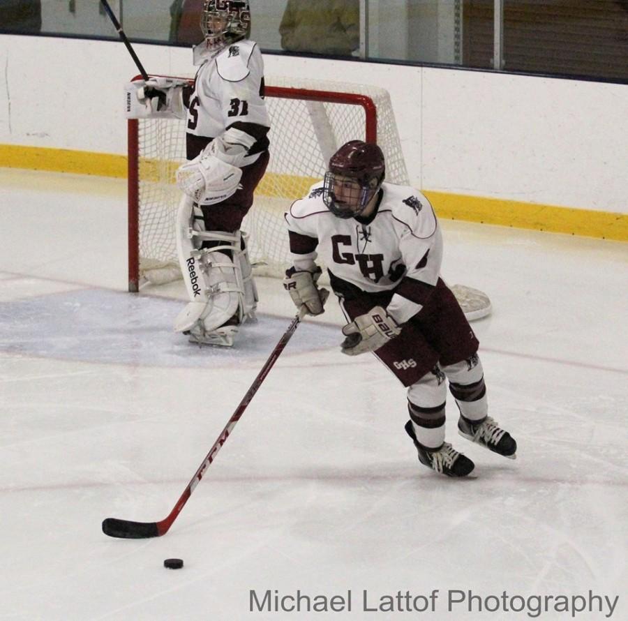 Junior Sal Costanzo carries the puck in the defensive zone