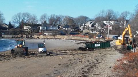 Workers clean up the wreckage of the Blue Ocean at Niles Beach Tuesday afternoon