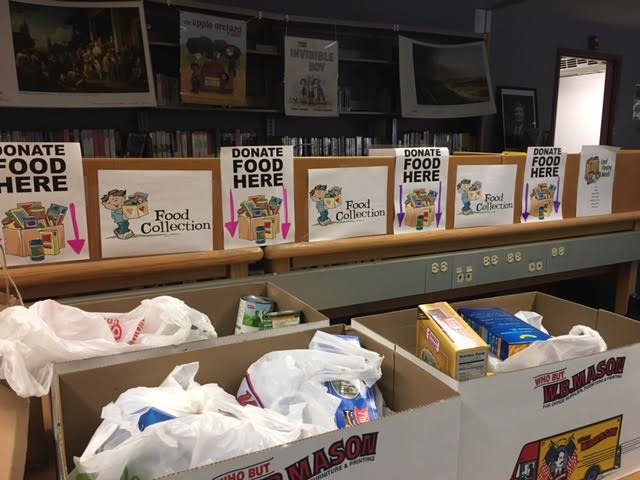 Students can bring food donations to the library to benefit The Open Door