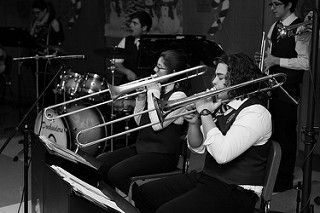 Owen Byran and Asha Egmont play the trumpet at one of their annual coffee house performances