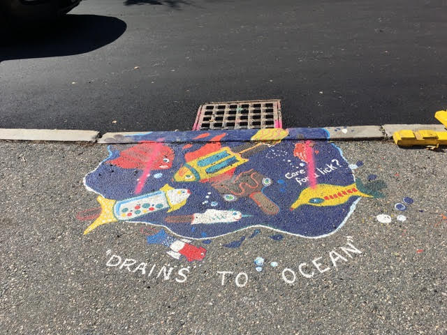 This Drain smART painting in Salem was twice the size until half of it was paved over recently