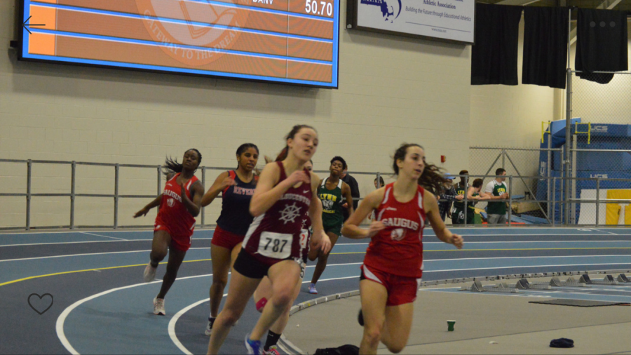 Lila Olson  sprints to the finish last year at Reggie Lewis Athletic Center