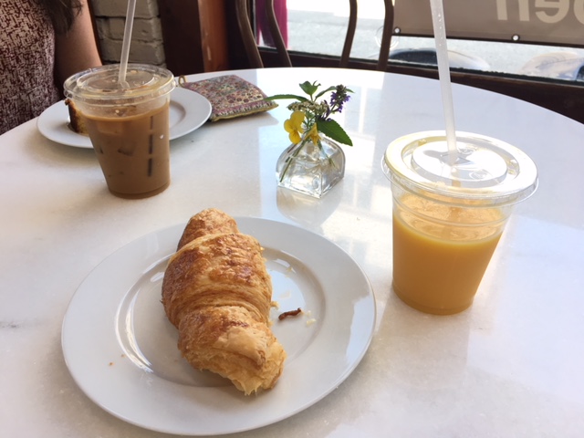 A pastry and drinks from local cafe, Sandpiper Bakery.