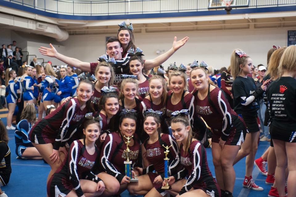 GHS cheerleaders pose with the first place trophy at North Regional Competition last weekend