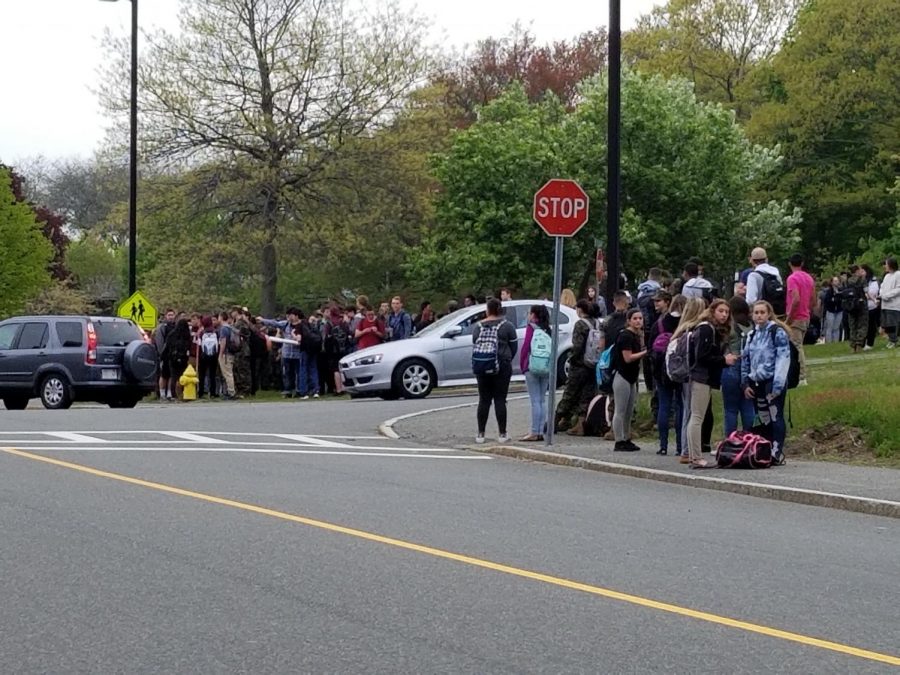 Students gather outside GHS Thursday morning due to equipment malfunction in the Vocational Wing
