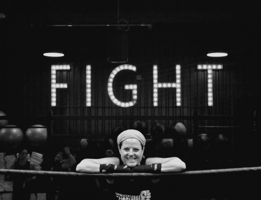 Photography teacher Emily Harney gets ready to box at the Haymakers for Hope event