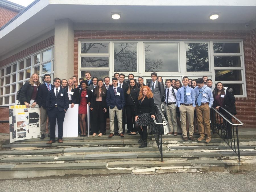 GHS DECA students pose before heading to the competition
