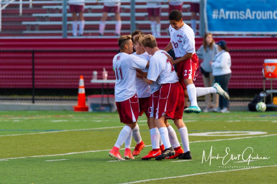 After trailing the whole game, Gloucester celebrates the goal that put them in the lead