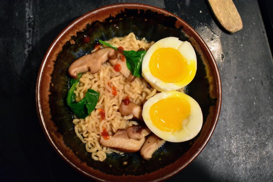 Ramen, topped with an egg and bit of sriracha, and ready to eat!