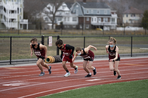 Junior Kyle Clifford, sophomore Deston Cauthers, and freshman Faith Castellucci begin the 1000m alongside an opponent from Saugus.
