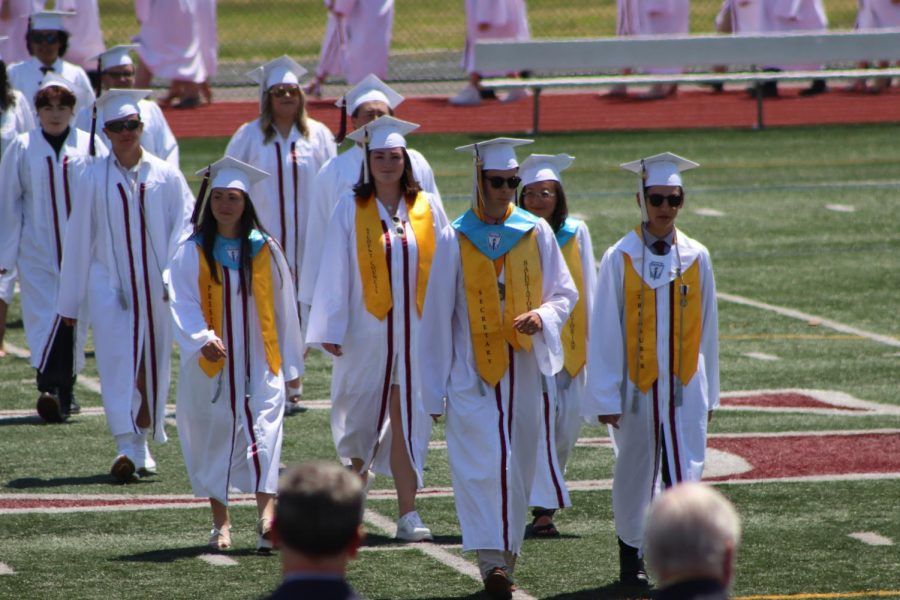 Class officers lead their classmates to the commencement ceremony