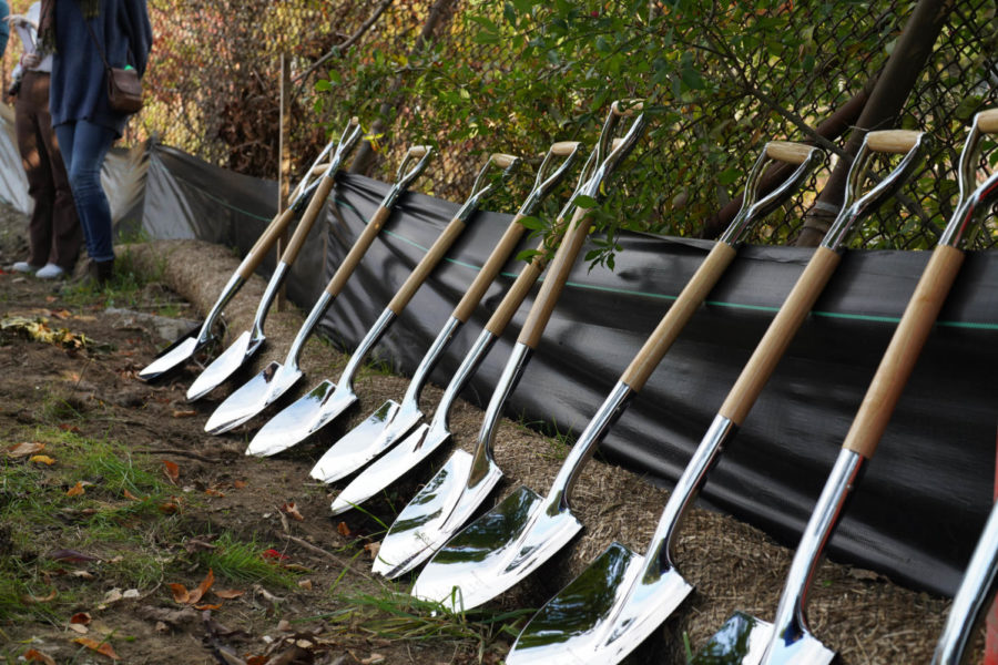 Engraved shovels laid out before the groundbreaking 