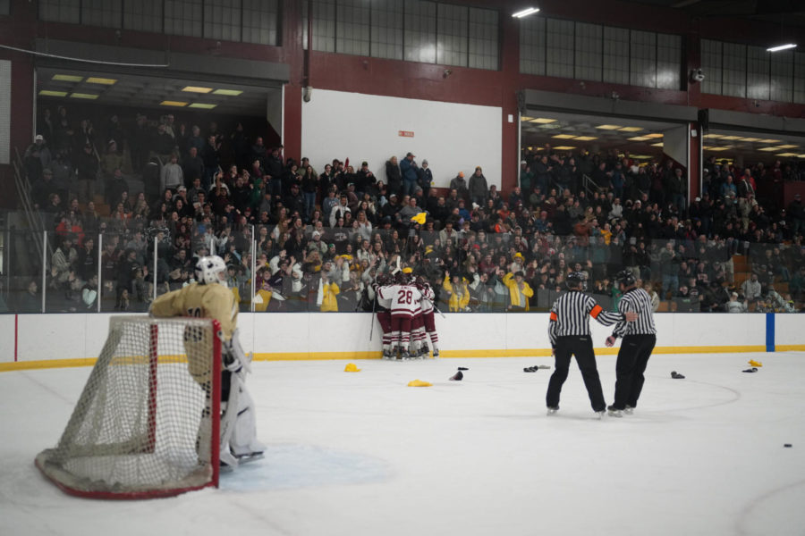 GHS fans shower the ice in hats after Jack Costanzos hat trick.