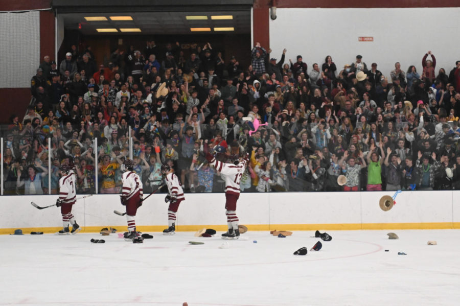 Gloucester fans throw hats on the ice to celebrate captain Jack Costanzos Hat Trick.