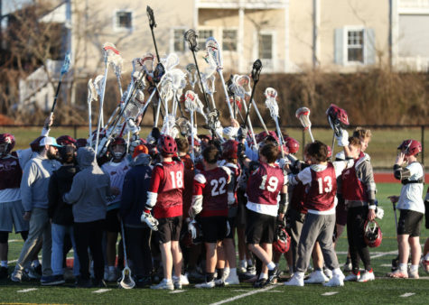 Gloucester boy’s lacrosse pictured holding up their sticks after first day of tryouts