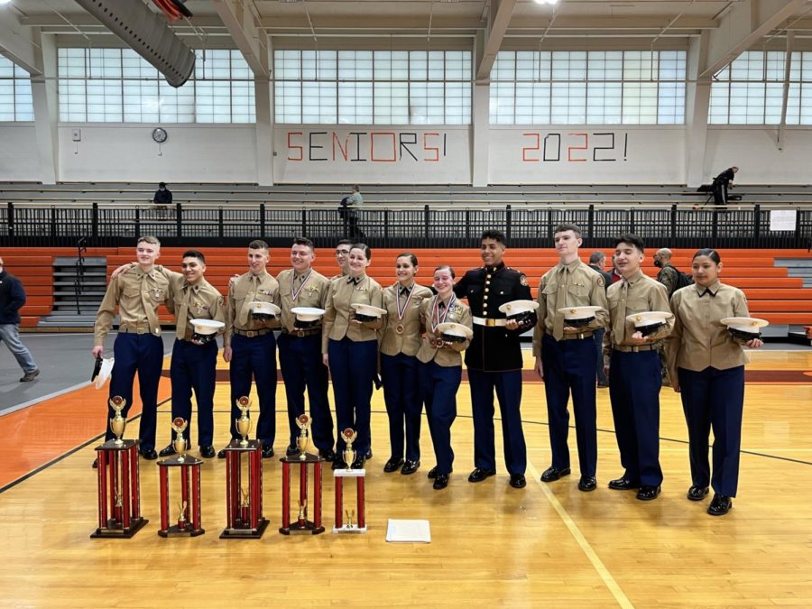 MC+JROTC+members+pose+with+their+newly+won+trophies.