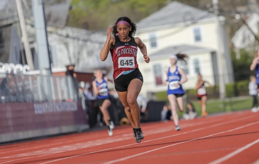 Senior Captain Darcy Muller leading the pack in the 200m dash against Danvers last Wednesday