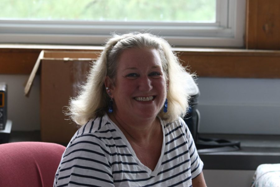 New math teacher Ms. Shea smiles brightly for the camera.