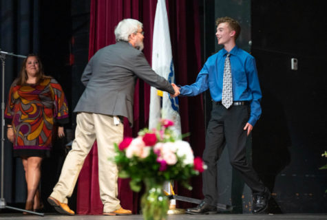 Senior Tyler Weed (right) wins a STEM award at last years academic recognition night.