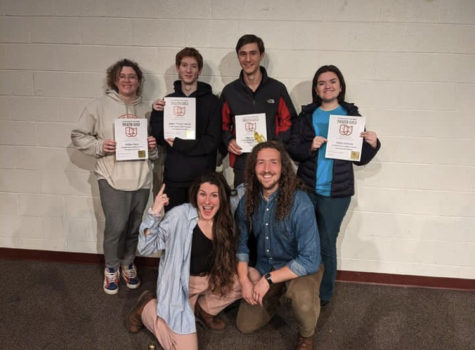Willow Barry, Elijah Sarrouf, Treely Dowd, and Malia Andrews pose with their awards, and the judges. 