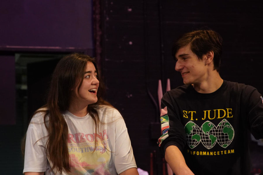Emily Gossom and Elijah Sarrouf sing to each other at rehearsal. 