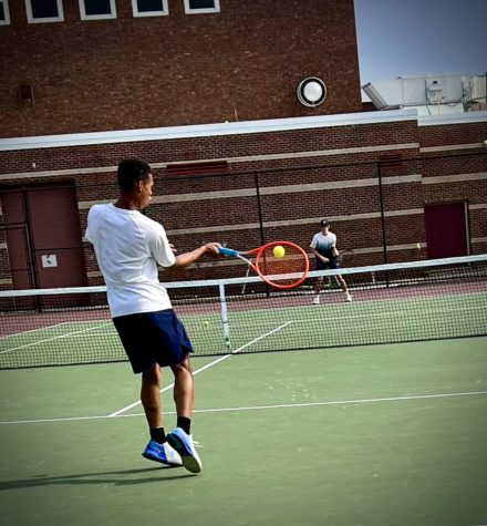 Andry Payano Sosa returns the ball to his opponent. 