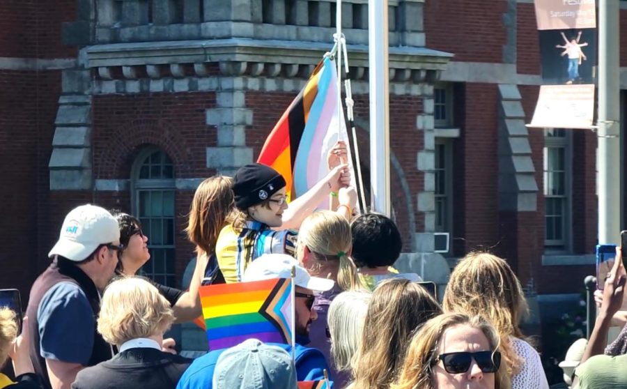 GHS students raise the Pride Flag at Gloucester City Hall.