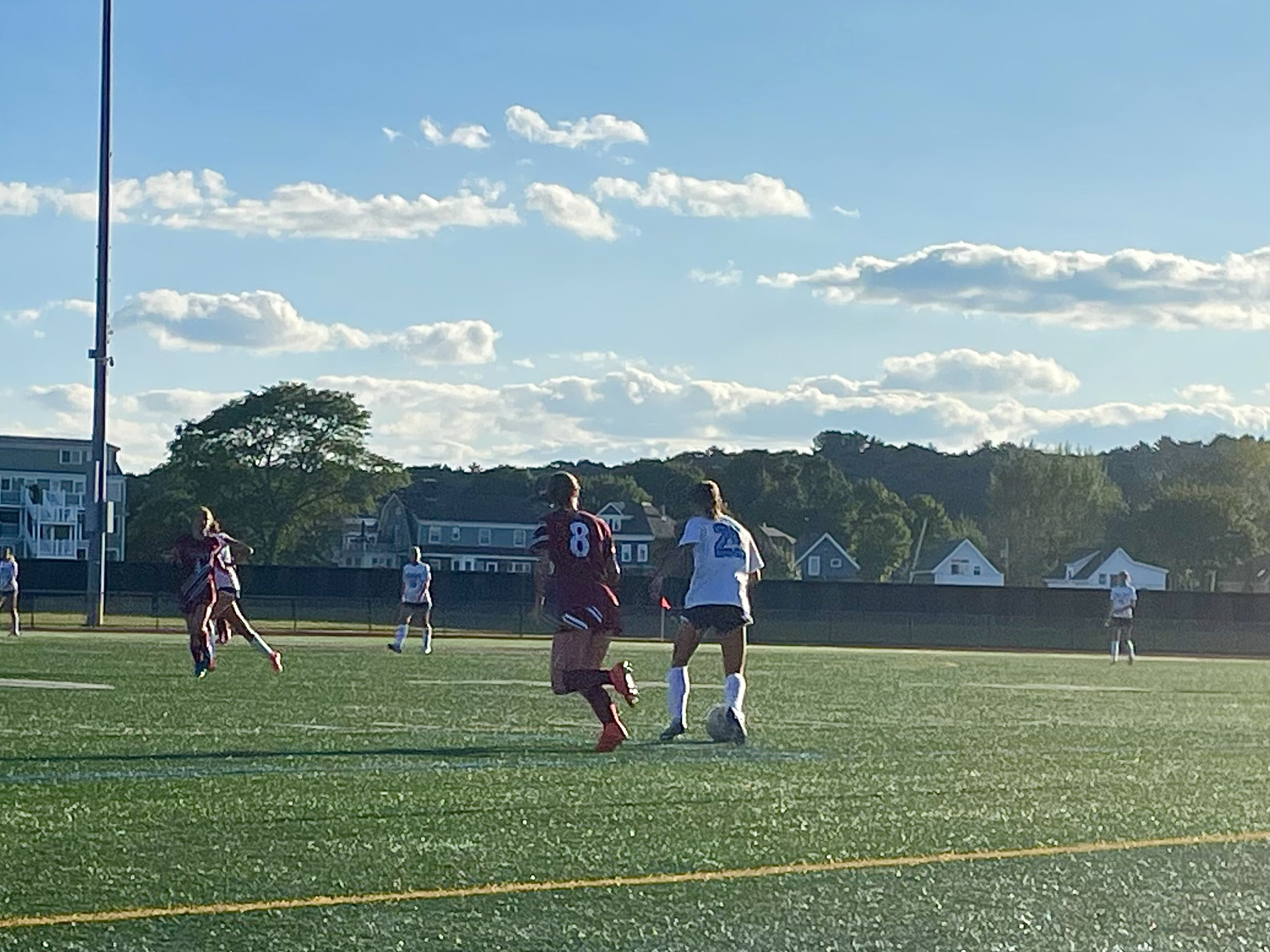 Sophomore Hope Castellucci fights Peabody for the ball