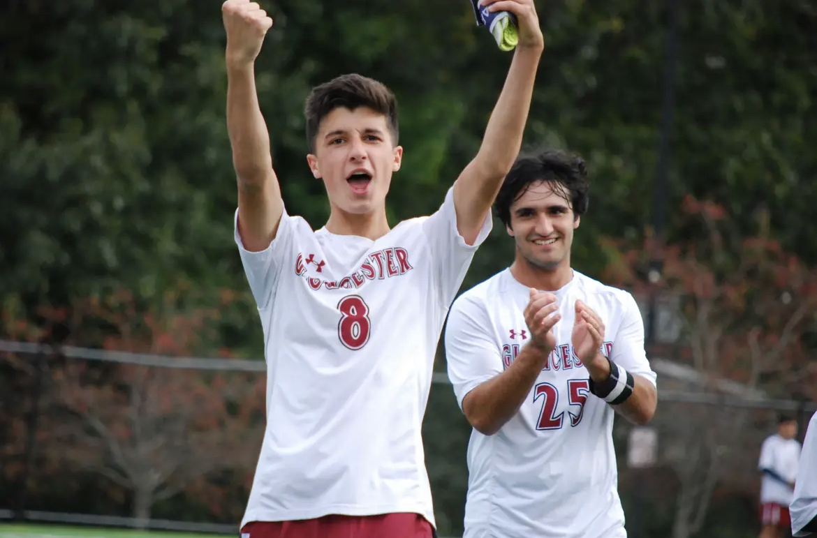 Domenic Paone and Leo Vitale cheer after a goal.