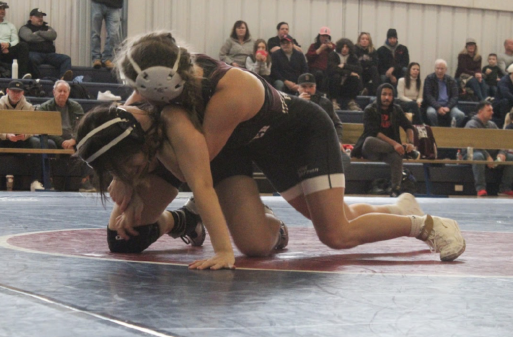 Morgan Pennimpede takes down her opponent at last nights meet. 