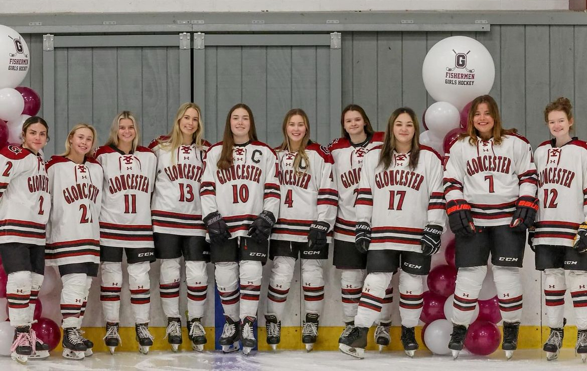 GHS Girls Hockey team poses for photo on senior night. 