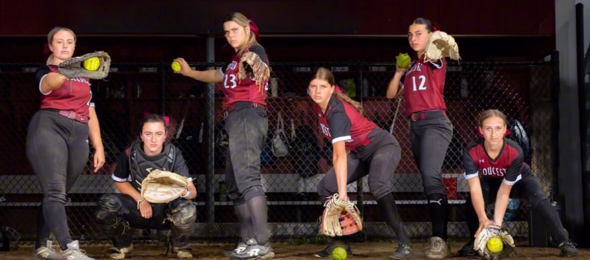 Softball starters pose for a picture.