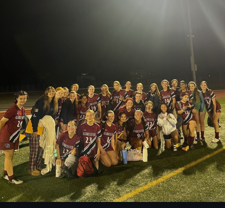 Girls soccer team gathers for a photo after its Friday night win against Salem.