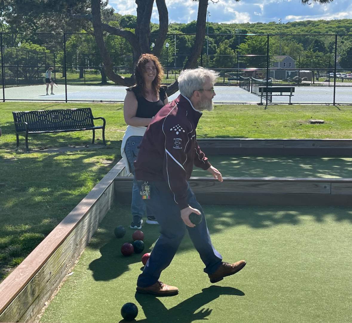 Principal Cook participating in last year's bocce ball tournament.