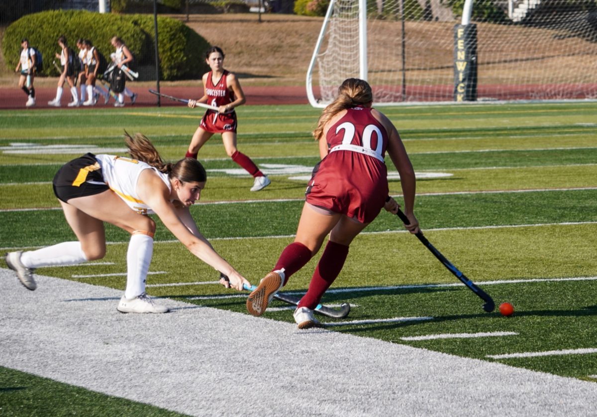 Mackayla Allen saves the ball on the sideline in Tuesday’s matchup.