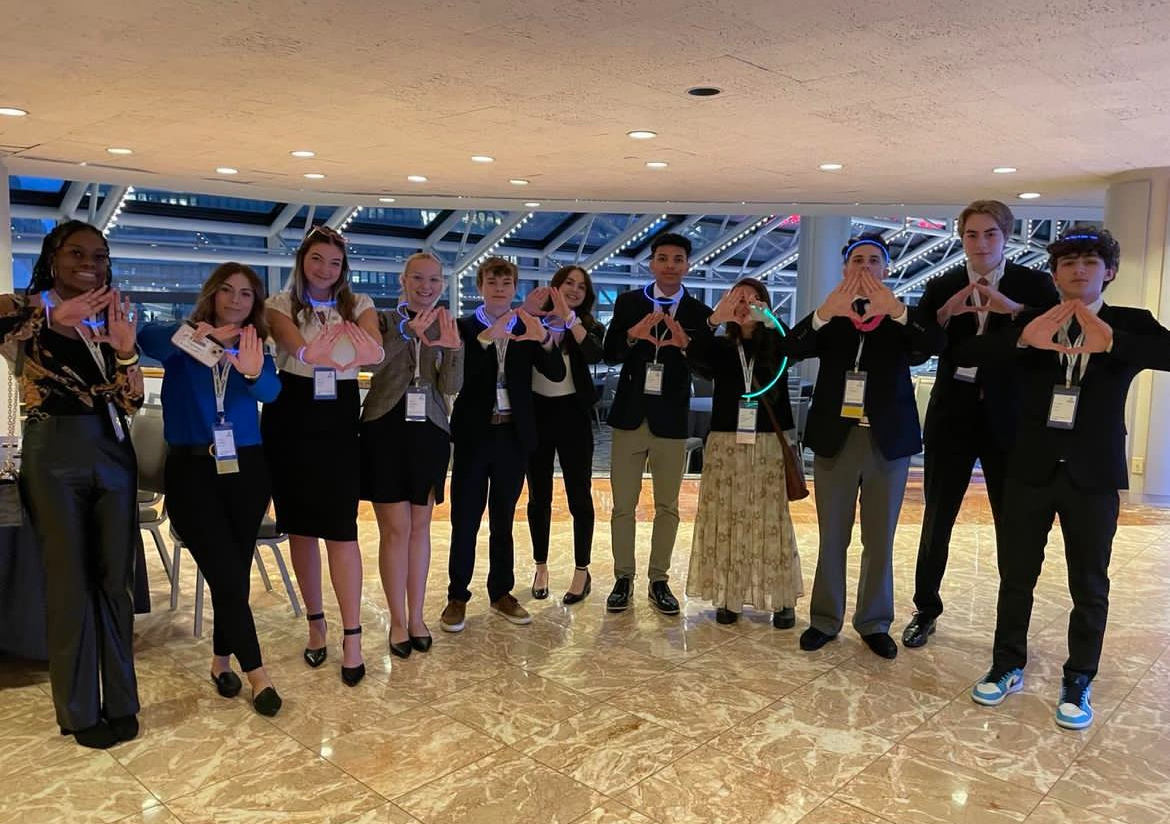 GHS DECA all-state competitors pose during the 2024 SCDC competition in Boston. 