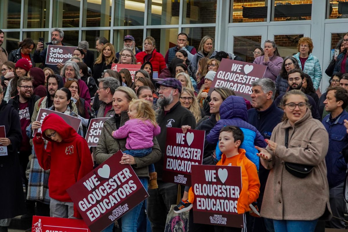 Members of yesterday's rally demonstrate on GHS' front steps.