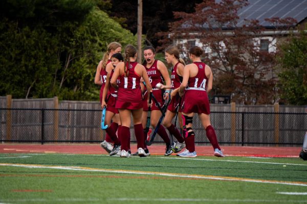 The Gloucester Field Hockey team celebrates a goal earlier this season. The team awaits their final power ranking, which doesn't have a confirmed release date.