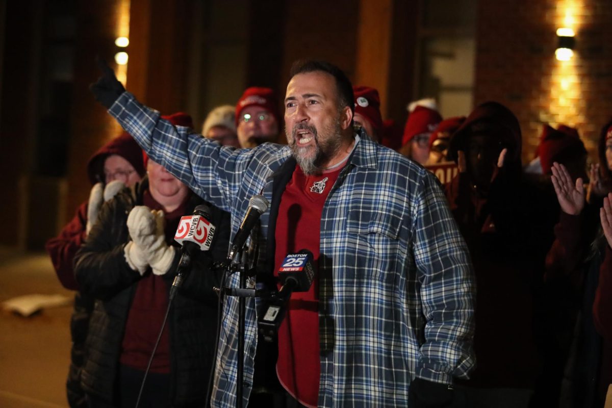 Bargaining team member Rich Francis shows his frustration with the mayor and the superintendent during tonight's press conference. 