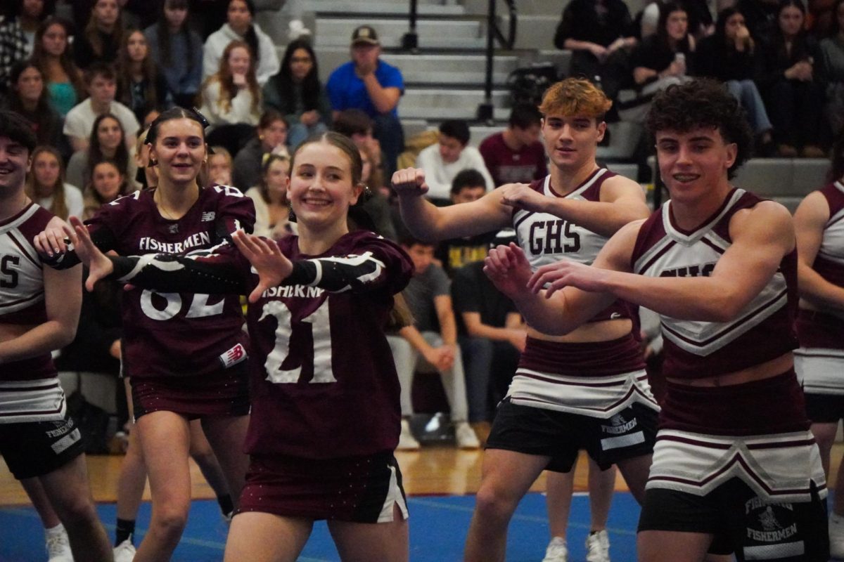The Football Team and Cheerleaders dance to "hype up" the GHS crowd during a pep rally earlier this year.