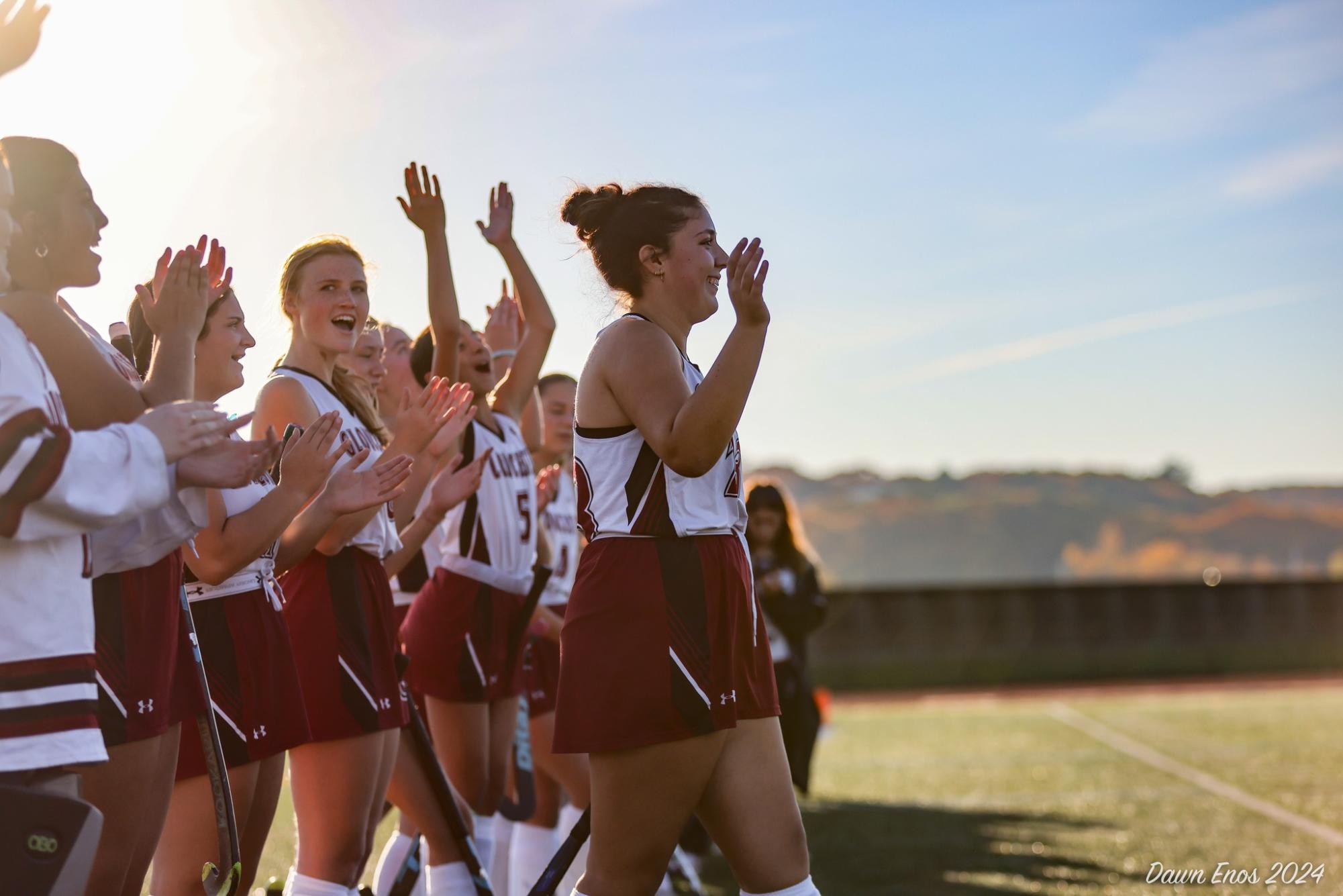 Ivana Ferrara waves to the crowd during Gloucester's senior night matchup earlier this season.