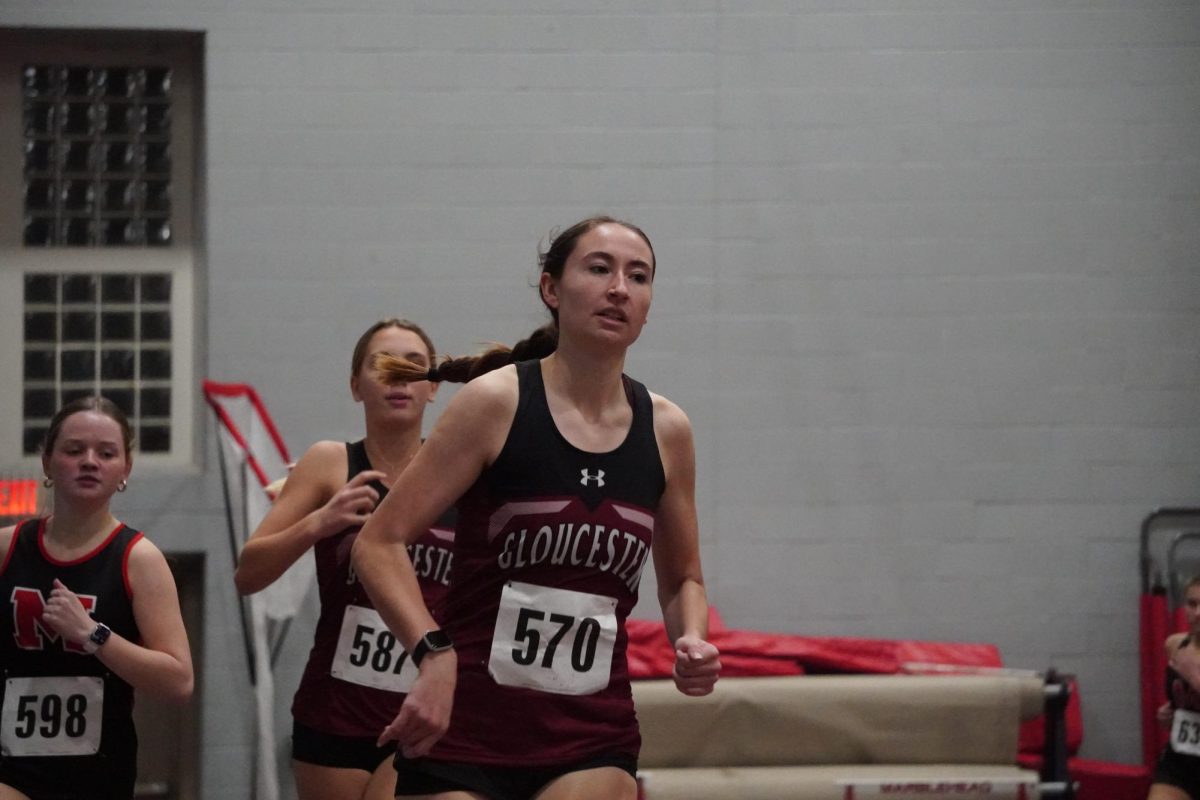 Hope Castellucci leads a pack of Beverly and Marblehead runners in the 1,000 meter race on Thursday.